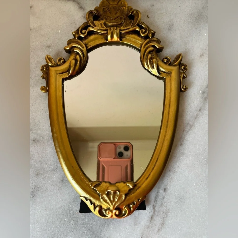 Ornate Gold and Black Decorative Mirror